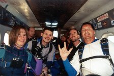 Deaf skydivers riding to altitude